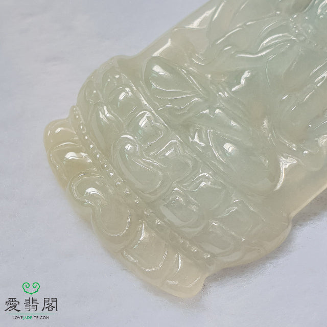 Close-up of Guan Yin jadeite carving showing texture and translucency