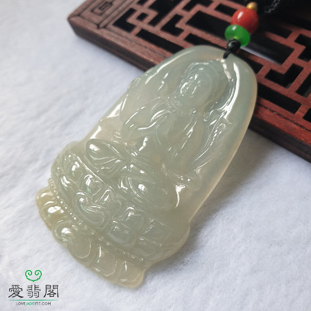Close-up of Guan Yin jadeite carving showing texture and translucency