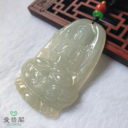 Close-up of Guan Yin jadeite carving showing texture and translucency