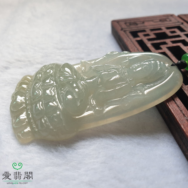 Side angle of natural jadeite Guan Yin pendant with smooth polish